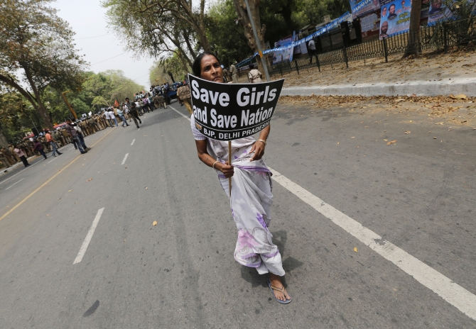 A woman participates in a protest against the Delhi gang rape