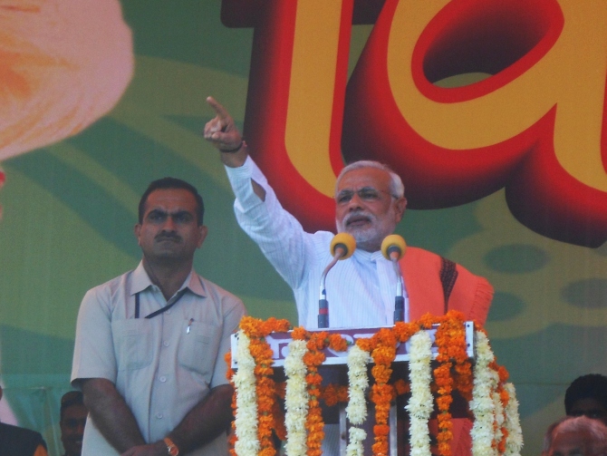 Gujarat Chief Minister nar5endra Modi speaks at the rally in Agra