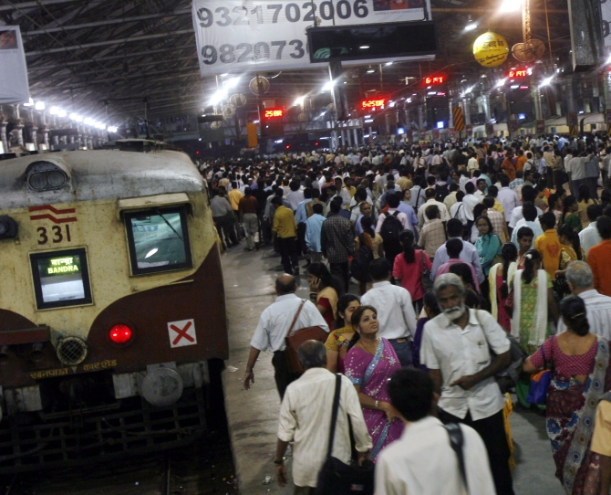 People walk on platforms of the Chhatrapati Shivaji Terminus railway station, which was targetted on 26/11 