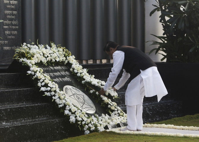 Maharashtra's Chief Minister Prithviraj Chavan places a wreath as he pays tribute at the Gymkhana police memorial marking the November 2008 Mumbai attacks
