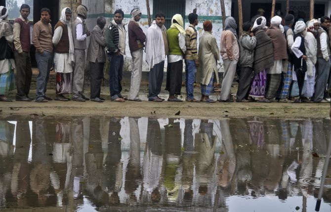 Voters wait to cast their ballot in Shravasti town, Uttar Pradesh.