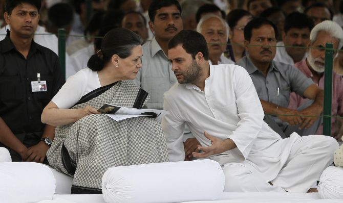 Congress President Sonia Gandhi listens to her son party Vice-President Rahul Gandhi.