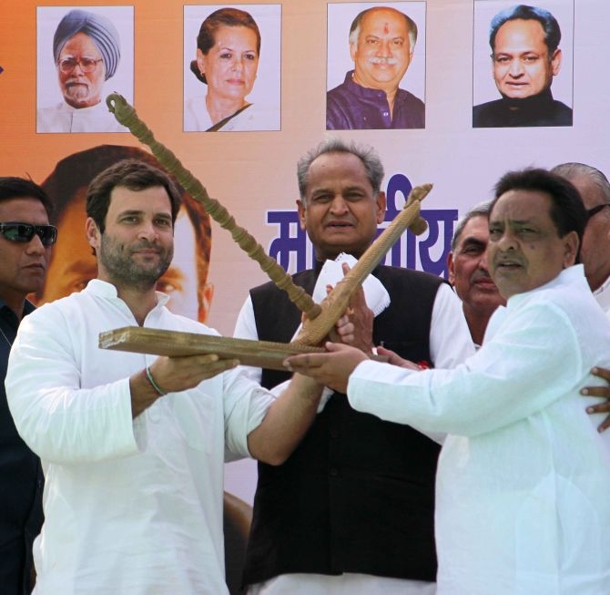 Congress Vice President Rahul Gandhi with Rajasthan Chief Minister Ashok Gehlot at a poll rally in Churu