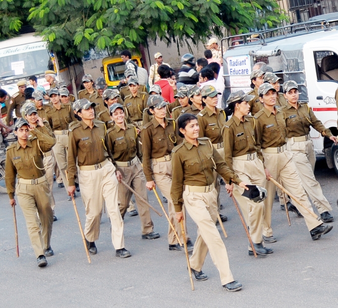 Police personnel deployed outside a polling booth in Rajasthan