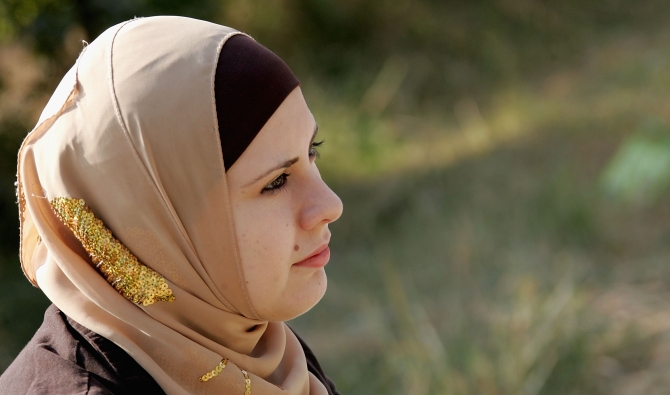 An Iraqi female student wearing a veil
