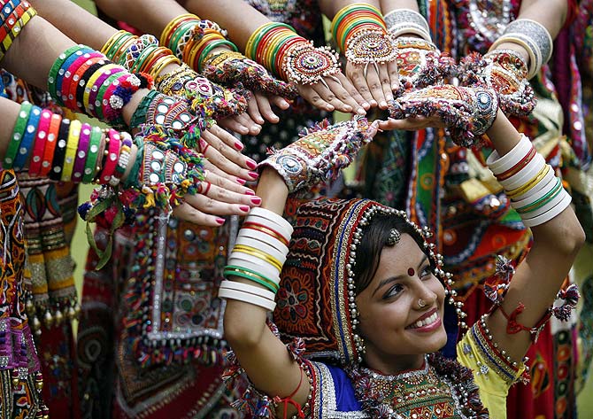 A girl gets ready for the coming Navratri festivities in Ahmedabad.