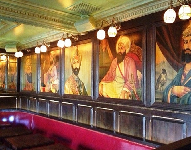 The pictures of Sikh gurus have now been removed from the bar