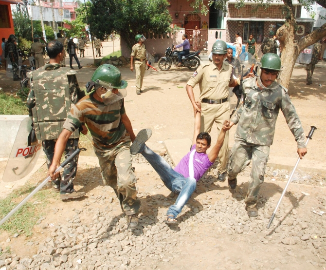 Police crackdown on an anti-Telangana supporter in the Vizianagaram district in Andhra Pradesh