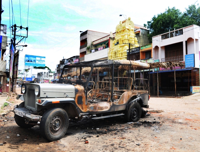 United Andhra supporters torch a jeep in Vizianagaram 