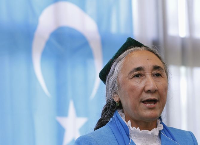Uighur leader Rebiya Kadeer delivers a speech in front of a East Turkestan flag, in Tokyo.