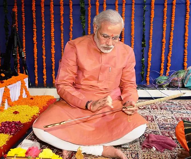 PHOTOS: Modi worships swords and guns