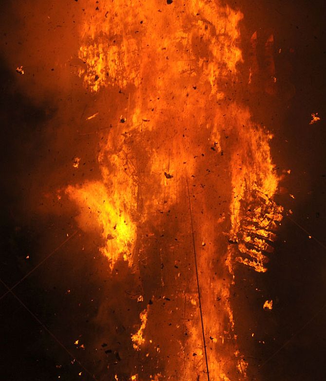 The Ravana effigy in flames at the Dussehra celebrations at Subhash Maidan in New Delhi