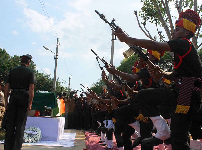 Army personnel give the 21 gun salute to martyred Lance Naik Mohd Firoz Khan in Hyderabad on Thursday