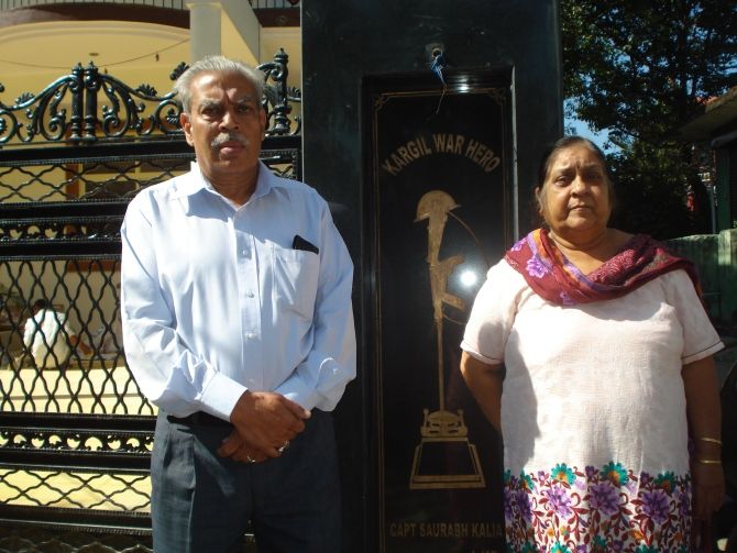 Captain Saurabh Kalia's parents outside their home