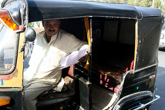 Auto driver Mushtaq Ahmad in Srinagar