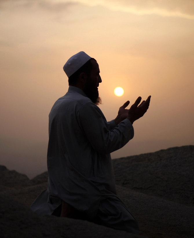 A Muslim pilgrim prays atop Mount Thor in the holy city of Mecca