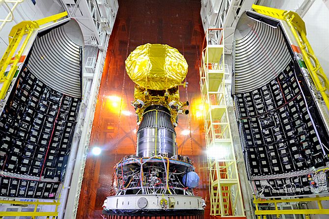 Mars Orbiter Mission Spacecraft attached to the 4th stage of PSLV-C25 and ready for heat shield closure