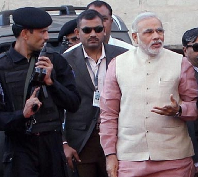 Gujarat Chief MInister Narendra Modi with his security team  