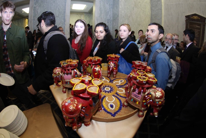 Guests admire the Diwali decorations at the Capitol Hill