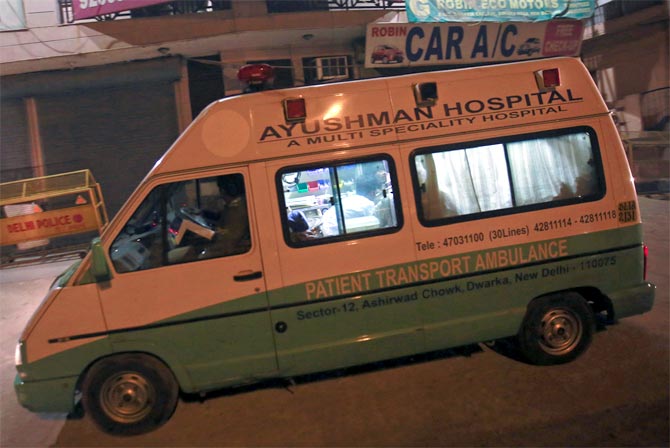 A hospital ambulance transports the body of a rape victim for cremation after it arrived from Singapore, in New Delhi December 30, 2012