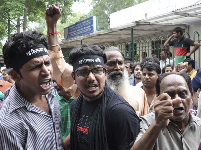 Demonstrators demanding capital punishment for a juvenile rapist sentenced to three years detention for the rape and death of  the December 16, 2012, rape victim in Delhi.