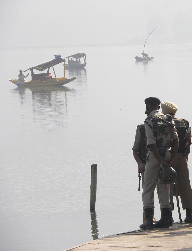 Security personnel keep vigil at the famous Dal Lake