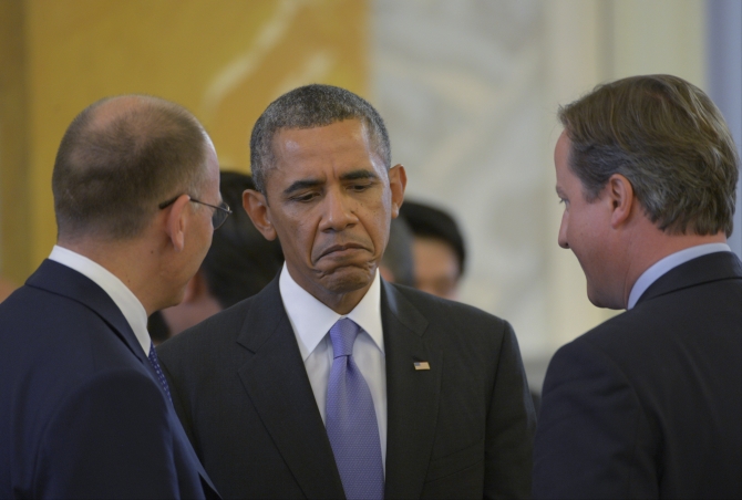 Italy's Prime Minister Enrico Letta, US President Barack Obama and British Prime Minister David Cameron at the second working session of the G20 Summit