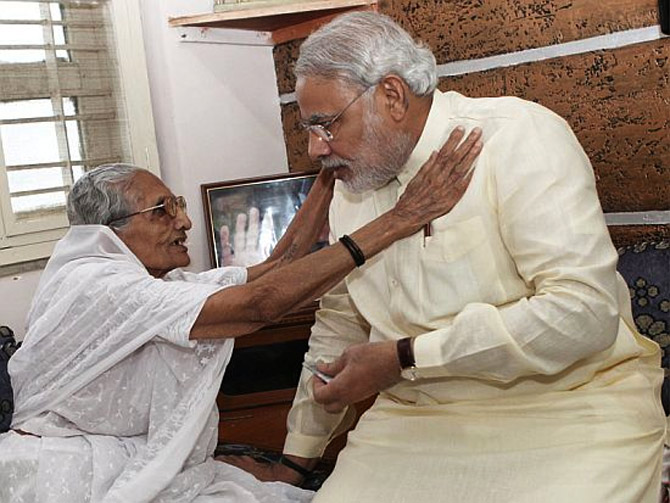 Narendra Modi seeks his mother's blessings.