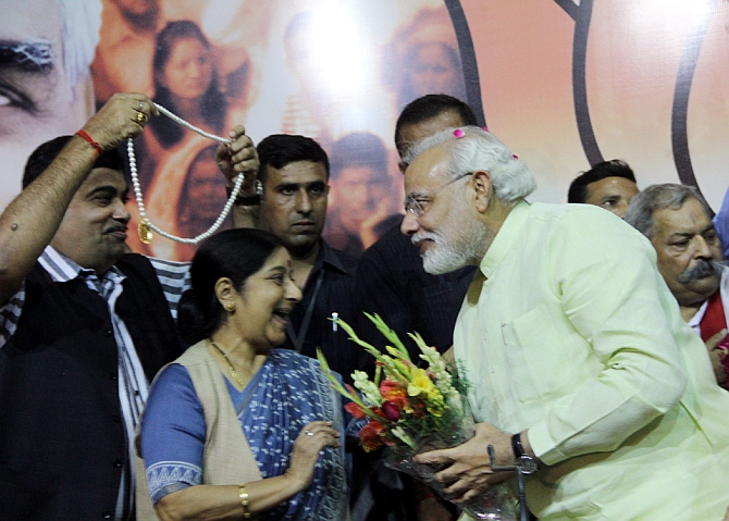 Modi and BJP leader Sushma Swaraj share a light moment