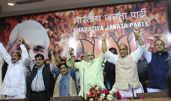 (from left) BJP leaders Venkaiah Naidu, Nitin Gadkari, Sushma Swaraj, Gujarat Chief Minister Narendra Modi, party president Rajnath Singh, and Arun Jaitley