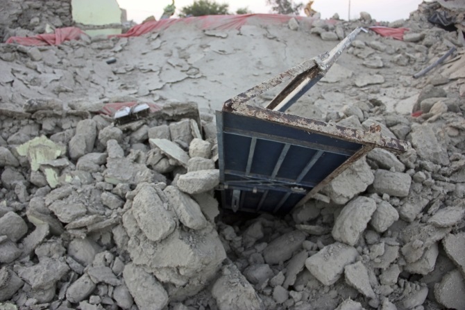 The rubble of a house is seen after it collapsed following the quake in the town of Awaran