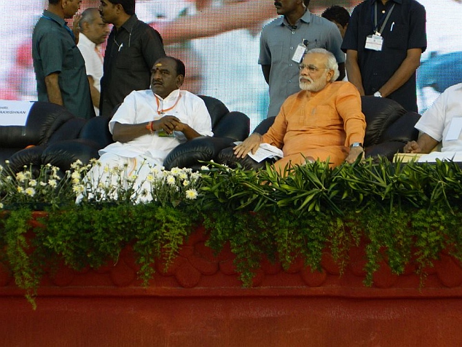 Gujarat Chief Minister Narendra Modi with Tamil Nadu BJP president Pon Radhakrishnan in Trichy