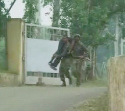 A video grab shows army personnel carrying their colleague on shoulders who was injured in a terror attack on Samba cantonment on Thursday