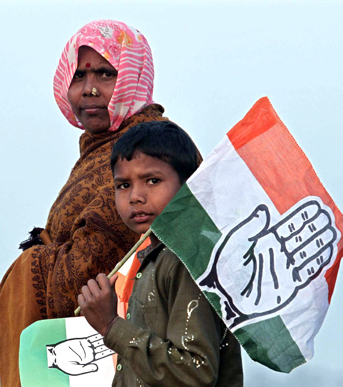 Supporters holding flags of the Congress at Hardoi district in Uttar Pradesh