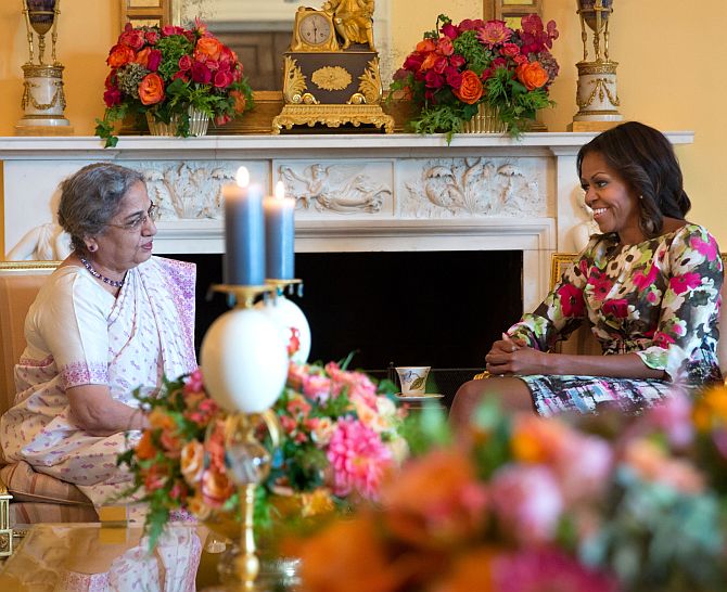 First Lady Michelle Obama hosts a tea for Gursharan Kaur in the Yellow Oval Room of the White House