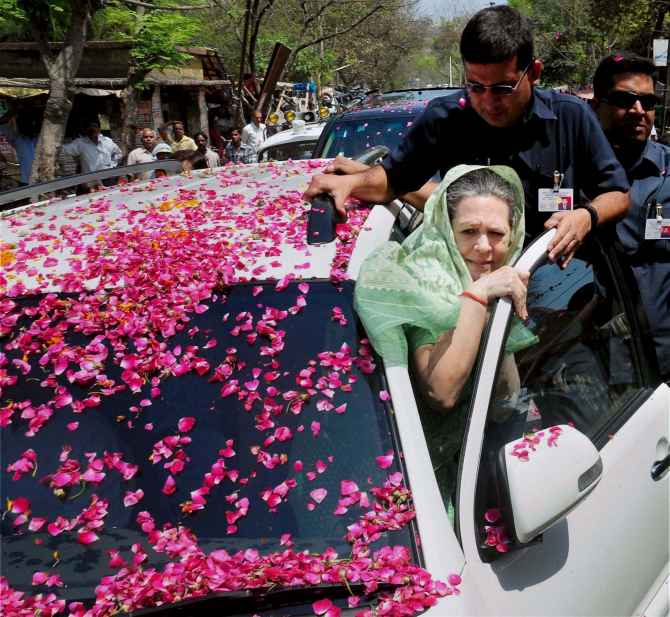 Sonia Ganhdi heads to the collectorate's office in Rae Bareli to file her nomination
