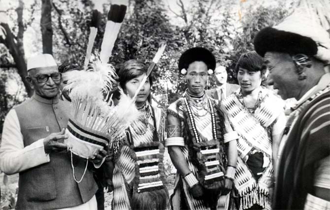 Folk dancers from Nagaland present their head gear to Prime Minister Morarji Desai the day after Republic Day 1978.