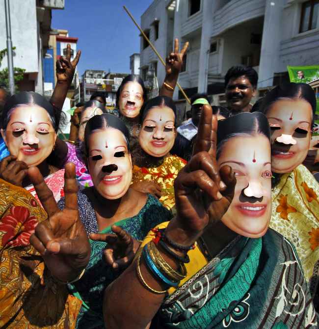 Supporters of AIADMK chief Jayalalithaa campaign in Chennai