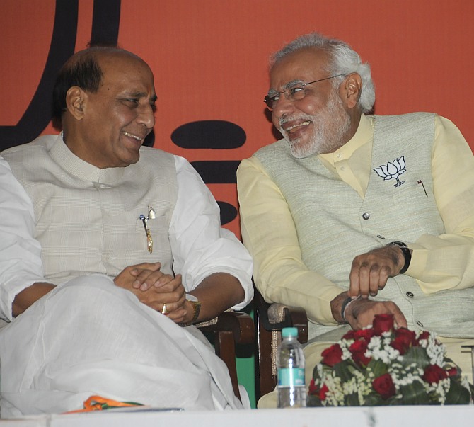 BJP chief Rajnath Singh with party's PM candidate Narendra Modi