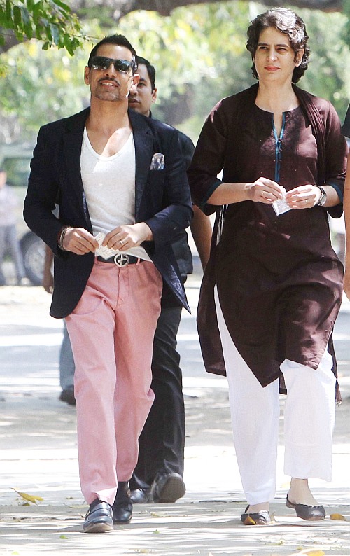 Robert Vadra and his wife, Priyanka Gandhi, step out to vote in New Delhi.