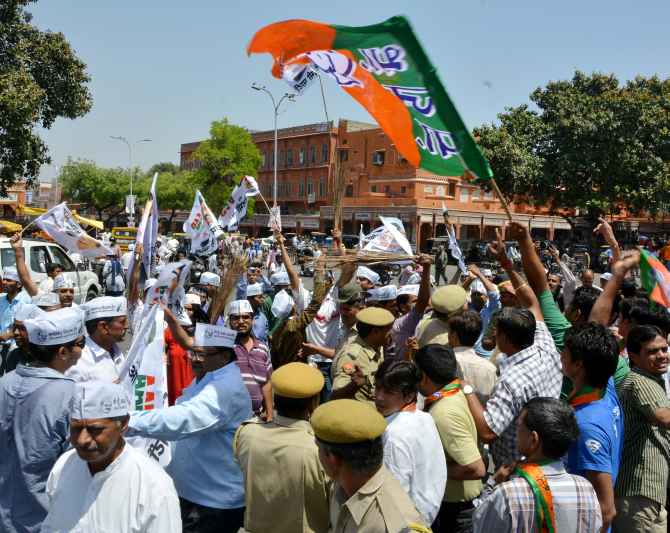 AAP and BJP workers nearly came to blows as their rallies crossed paths in Jaipur on Friday