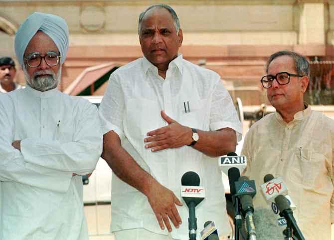 Manmohan Singh, Sharad Pawar and Pranab Mukherjee in this April 1999 archival photograph