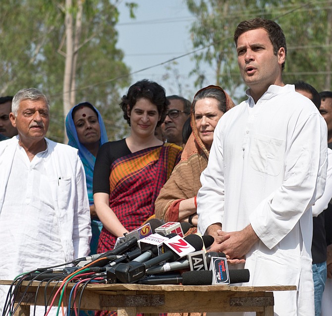 Rahul runs SUV over critics, files nomination with Gandhi parivar