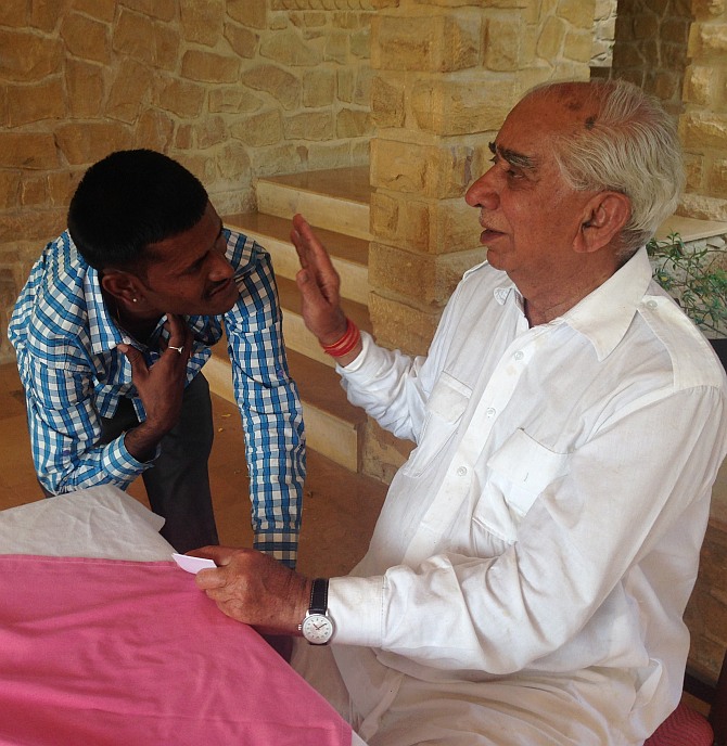 Jaswant Singh interacts with a supporter.
