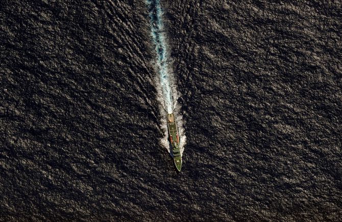 The Chinese Maritime Safety Administration vessel Hai Xin 01 is seen from a Royal New Zealand Air Force (RNZAF) P-3K2 Orion aircraft in the southern Indian Ocean, as the search continues for missing Malaysia Airlines flight MH370.