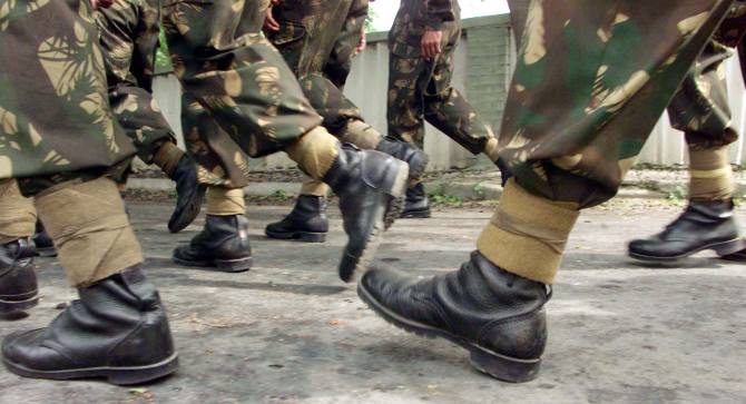 Soldiers of the 15 Corps march in Srinagar, June 14, 2002. The 15 Corps has been responsible for the defence of the Line of Control, dividing India and Pakistan in Kashmir since 1990.
