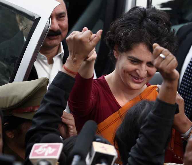 Priyanka Gandhi greets supporters after a meeting at Rae Bareli