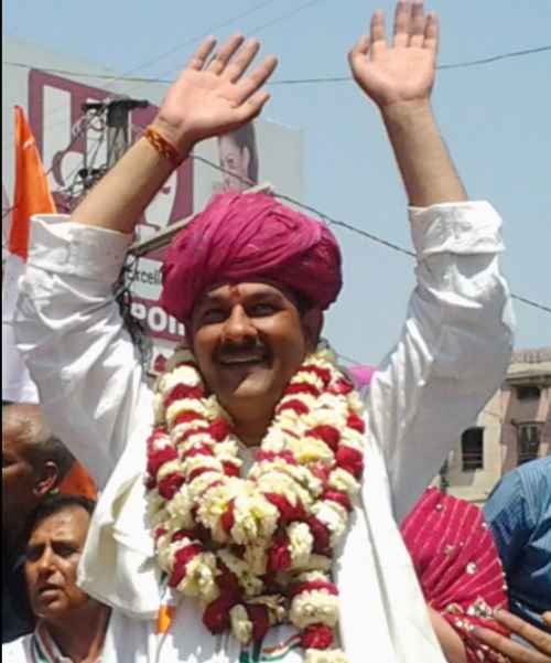 Jitendra Singh gestures while campaigning in Alwar