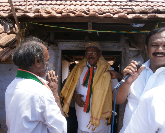 J M Haroon Rashid, the Congress candidate from Theni district, southern Tamil Nadu is greeted by supporters.