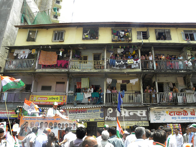 Milind Deora arrives at a Byculla chawl.